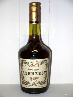 Spiritueux millesime Cognac Hennessy Bras armé circa 70